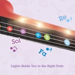 Hape - UKULELE (CHITARA) ROSU- INVATA SA CANTI CU LUMINI - imagine 2